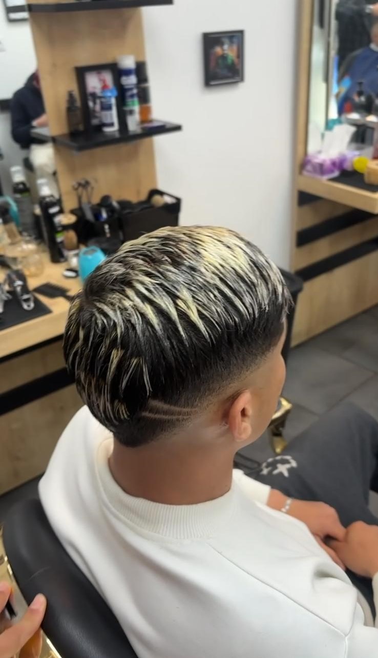 Resultado de corte masculino usado como referencia del estilo de trabajo de Adam.